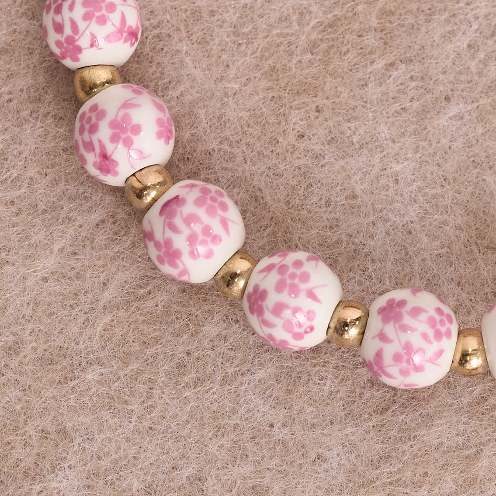 Christianartworkshop Bracelet de perles en céramique à motif floral bleu et rose avec une grande perle blanche : un rappel de la grâce divine - image 3