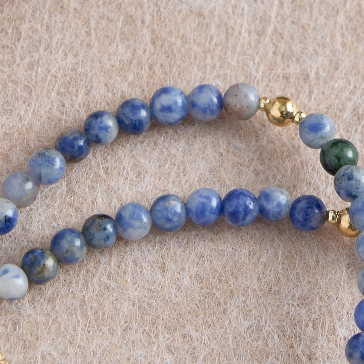Bracelet chapelet en agate fraise magnétique Christianartworkshop : emblème de la grâce et de la pureté divines - image 15