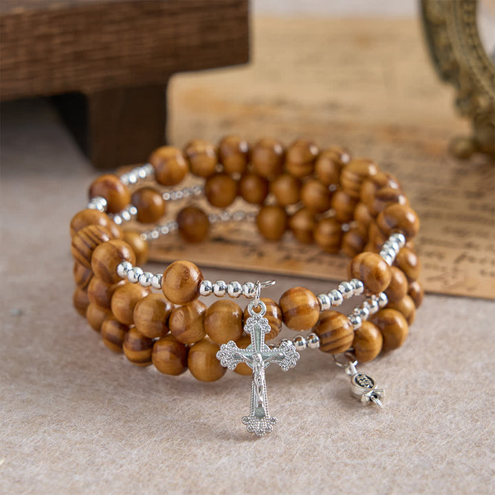 Christianartworkshop Bracelet chapelet en bois d'olivier naturel avec fil mémoire, orné d'Ichthys et d'un crucifix. - image 3
