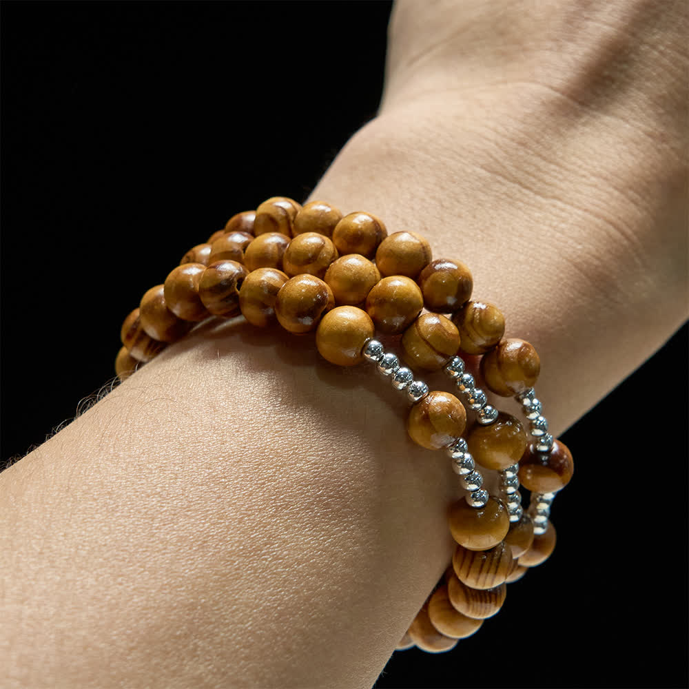 Christianartworkshop Bracelet chapelet en bois d'olivier naturel avec fil mémoire, orné d'Ichthys et d'un crucifix. - image 2