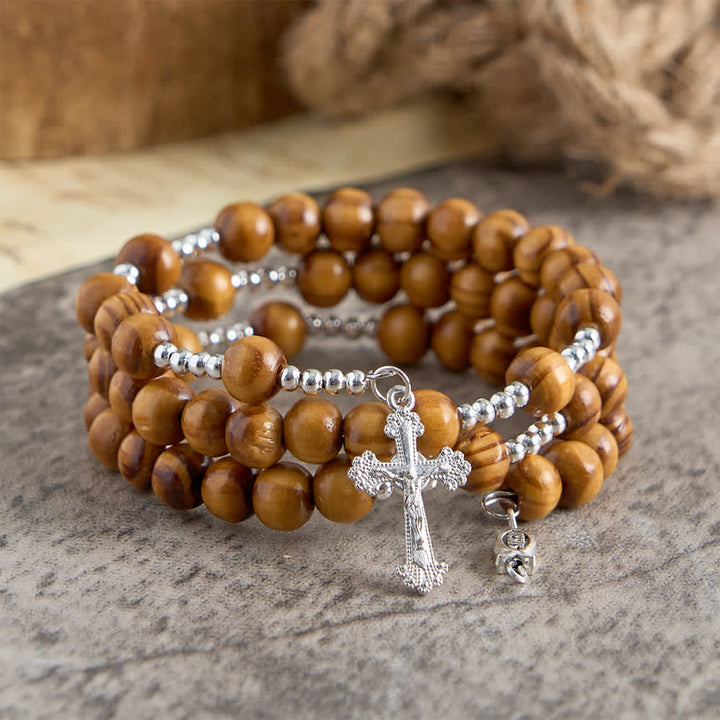 Christianartworkshop Bracelet chapelet en bois d'olivier naturel avec fil mémoire, orné d'Ichthys et d'un crucifix. - image 5