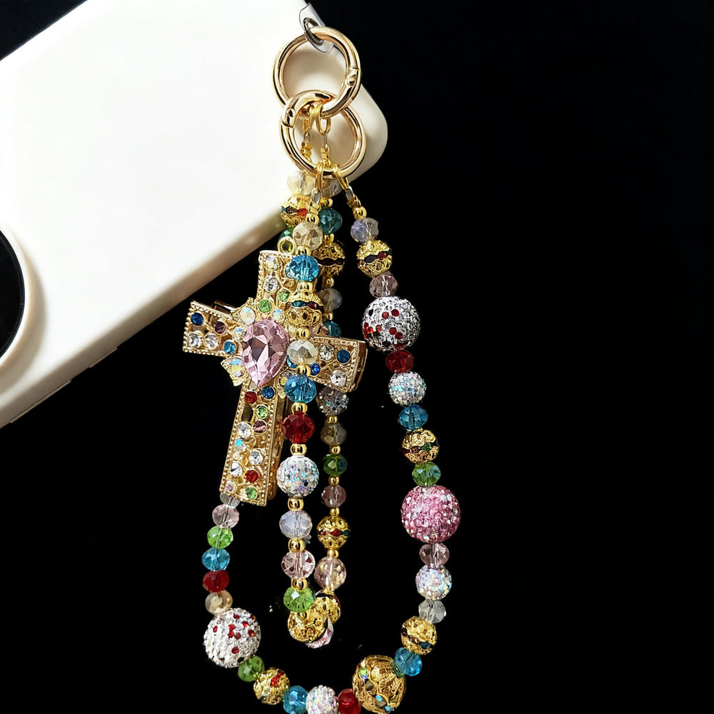 Christianartworkshop Breloque pour téléphone en forme de croix en cristal coloré avec pompon perlé : un symbole de foi vibrante et de lumière divine - image 1