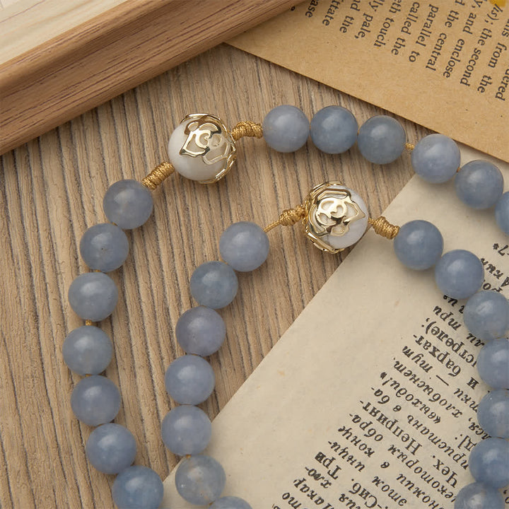 Christianartworkshop Chapelet en aigue-marine et howlite blanche : détails en filigrane doré avec saint Benoît pour une foi sereine - image 6