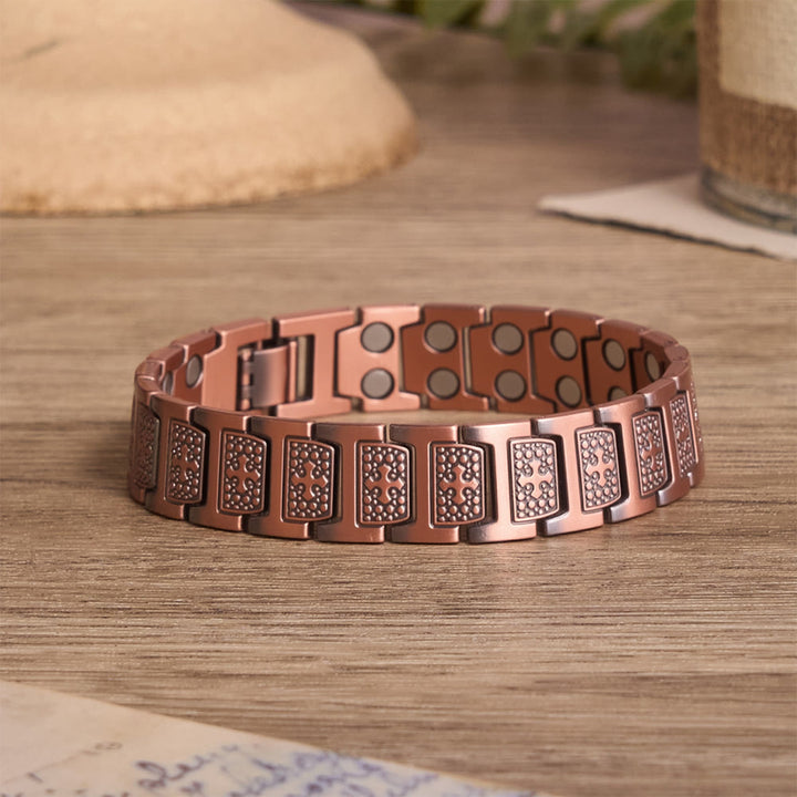 Christianartworkshop Bracelet rectangulaire à maillons pleins avec croix gravée encadrée de perles bulles et fermoir pliable et ajustable - Bronze - image 0