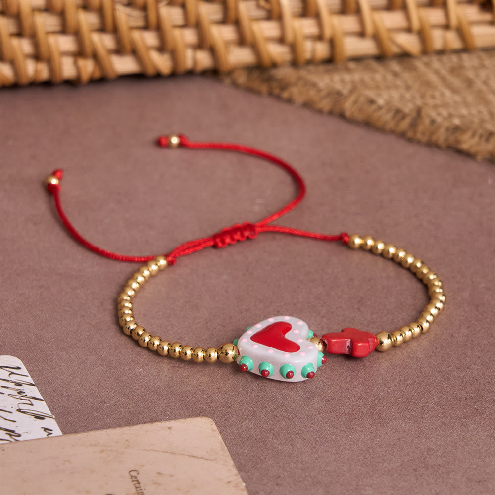 Christianartworkshop Bracelet ajustable en perles dorées, orné d'un cœur sacré décoré à la main, d'une petite croix et d'un motif de dessin animé. - image 11