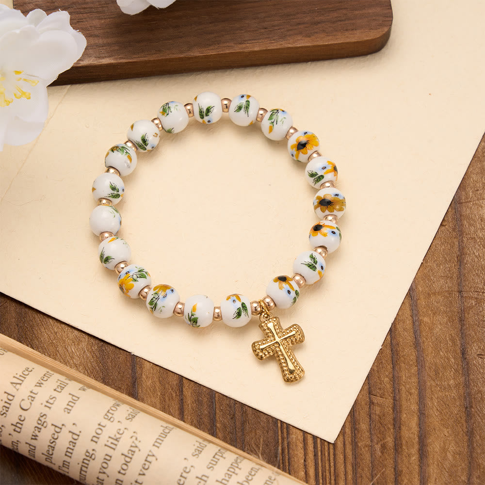Christianartworkshop Bracelet extensible en perles de céramique à motif floral (4 styles) avec breloque croix dorée : symbole de douce grâce céleste - Jaune - image 4