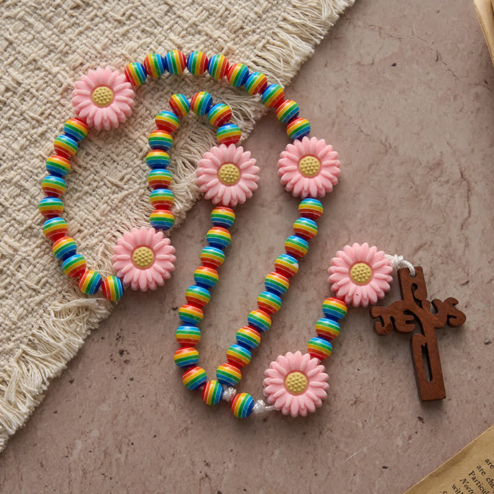 Christianartworkshop Chapelet enfant à rayures arc-en-ciel avec nœuds en forme de marguerite rose et croix de Jésus - image 2