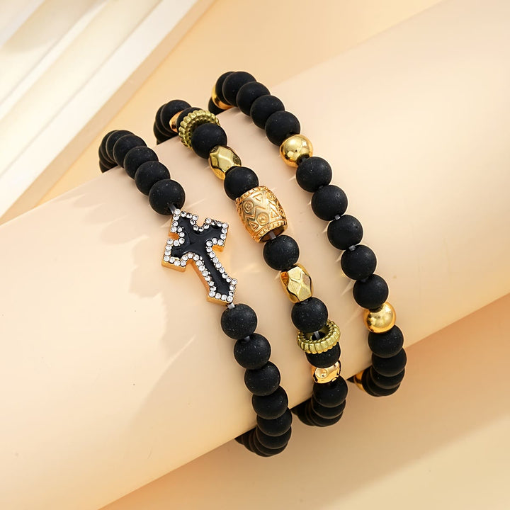 Christianartworkshop Bracelet extensible multicouche en perles de pierre noire mate avec croix pavée de zircon et entretoises dorées sculptées - image 2