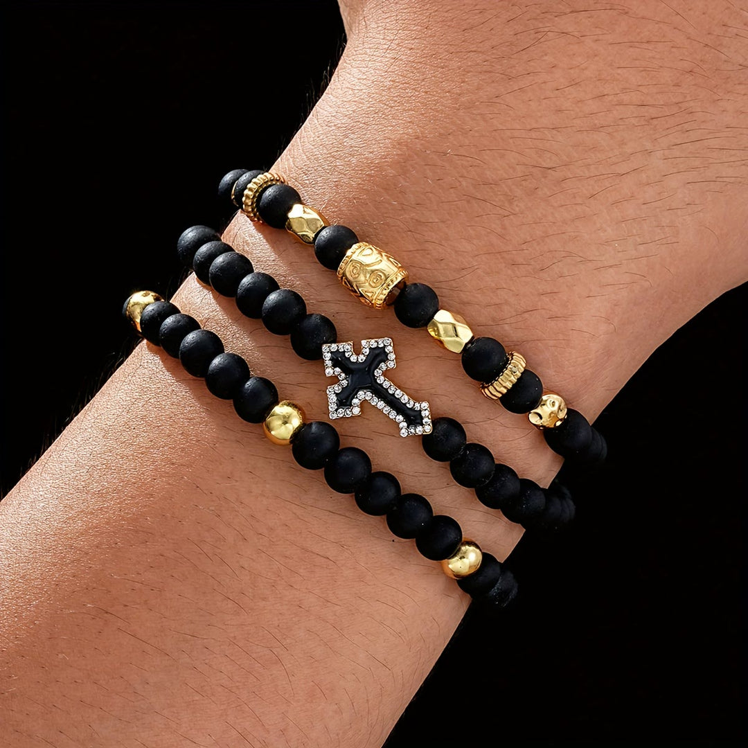 Christianartworkshop Bracelet extensible multicouche en perles de pierre noire mate avec croix pavée de zircon et entretoises dorées sculptées - Bracelet 3 pièces - image 0