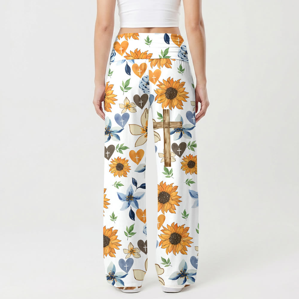 Pantalon taille haute stretch à jambes larges et imprimé intégral tournesol, cœur et croix de Christianartworkshop - image 1
