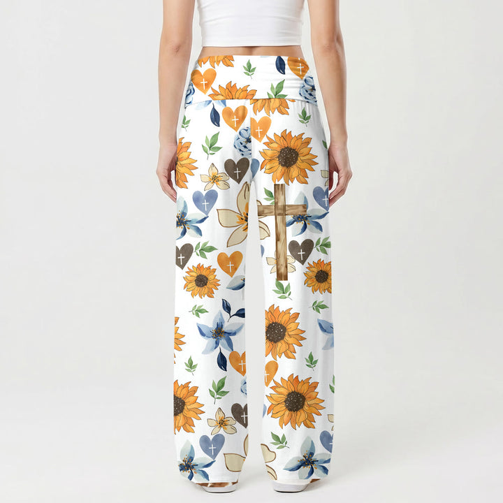Pantalon taille haute stretch à jambes larges et imprimé intégral tournesol, cœur et croix de Christianartworkshop - image 1