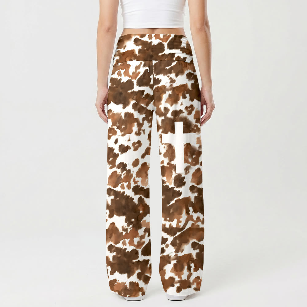 Pantalon Christianartworkshop à imprimé vache intégral, blanc uni, motif croisé vertical sur la cuisse, taille haute et jambes larges, revers. - image 1