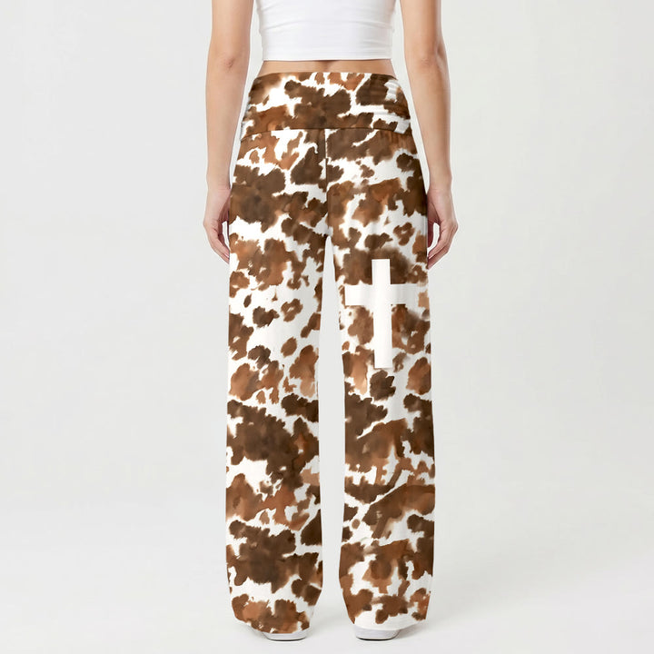 Pantalon Christianartworkshop à imprimé vache intégral, blanc uni, motif croisé vertical sur la cuisse, taille haute et jambes larges, revers. - image 1