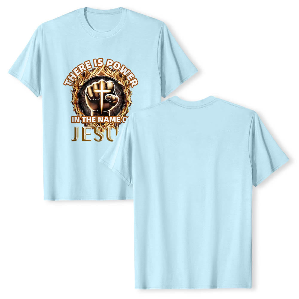 Christianartworkshop T-shirt à manches courtes « Il y a du pouvoir dans le nom de Jésus » avec poing serré, croix et flamme circulaire - image 10