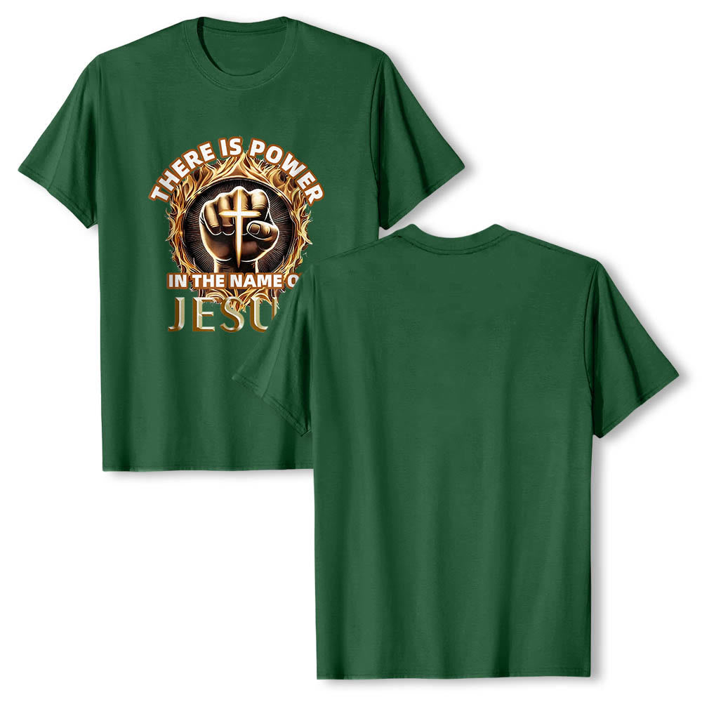 Christianartworkshop T-shirt à manches courtes « Il y a du pouvoir dans le nom de Jésus » avec poing serré, croix et flamme circulaire - image 1