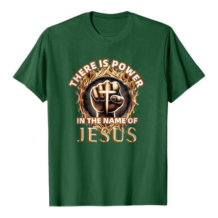 Christianartworkshop T-shirt à manches courtes « Il y a du pouvoir dans le nom de Jésus » avec poing serré, croix et flamme circulaire - Vert foncé - 2XL - image 0