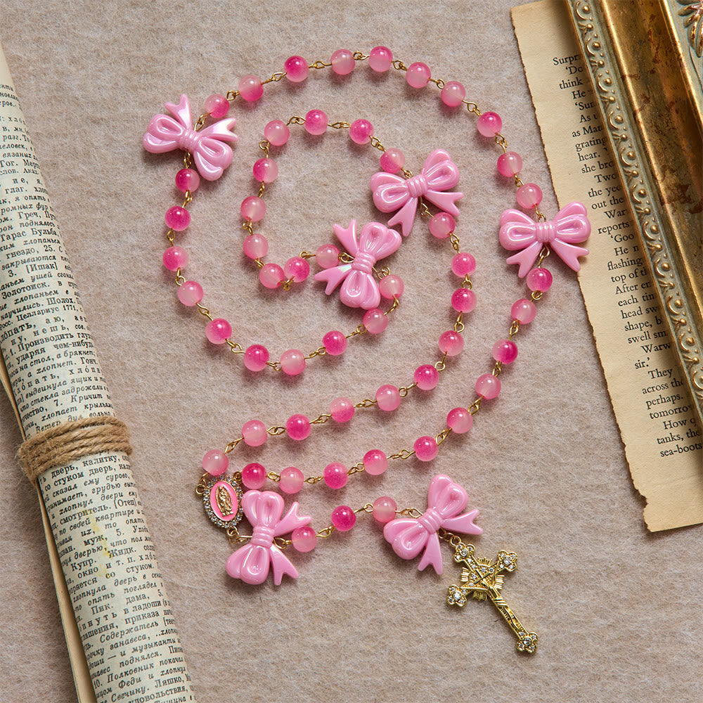 Christianartworkshop Chapelet girly bicolore à perles dégradées avec nœuds en résine brillante et crucifix doré orné de pierres précieuses - Chapelet à nœuds roses - image 0