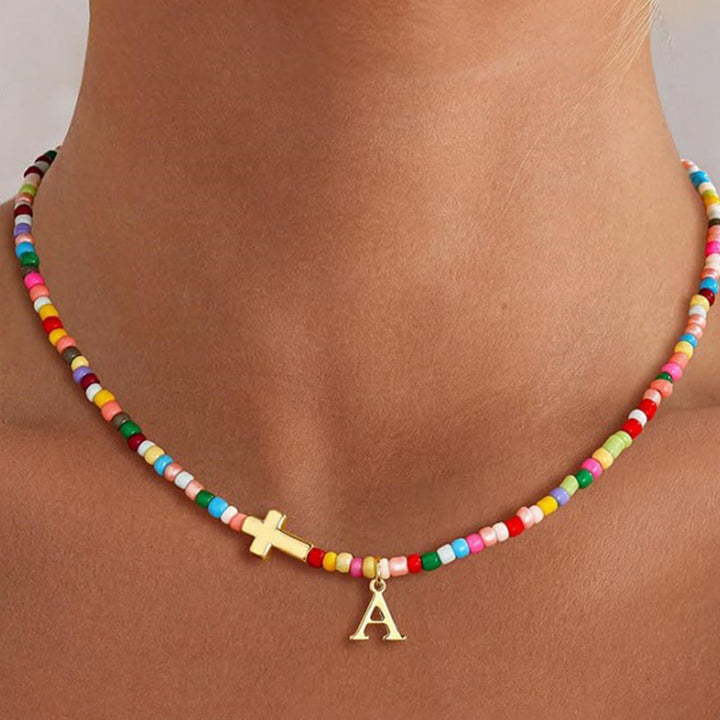 Christianartworkshop Collier ras du cou personnalisé avec pendentif croix et perles vibrantes : emblème intemporel de douce protection céleste - UN - image 0
